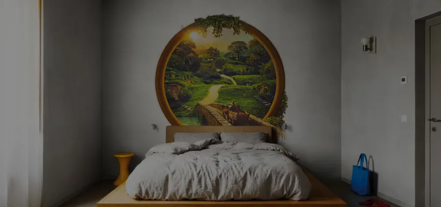 Sypialnia z okrągłym pejzażowym motywem tapety inspirowanej Lord of the Rings LondonArt